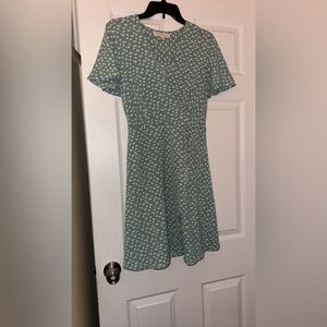 Light green dress with white flowers. Size Medium